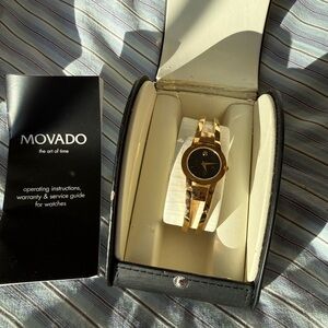 Movado Ladies Gold-Tone Watch with Black Dial